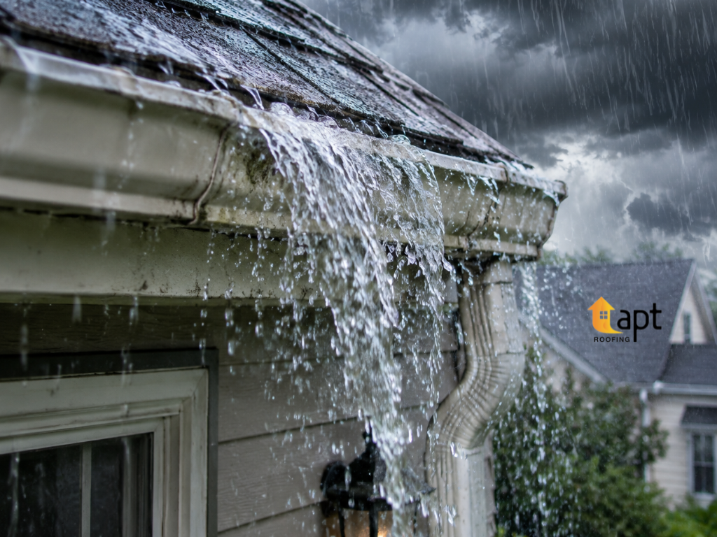 Overflowing roof gutter on a residential home showing signs of poor drainage during heavy rainfall. residential roof repair sydneyroof leak repair cost, tile roof repair sydney, emergency roof repair sydney, roof repairs sydney, roof refurbishing sydney, storm damage roof repair, emergency ceiling leak repair